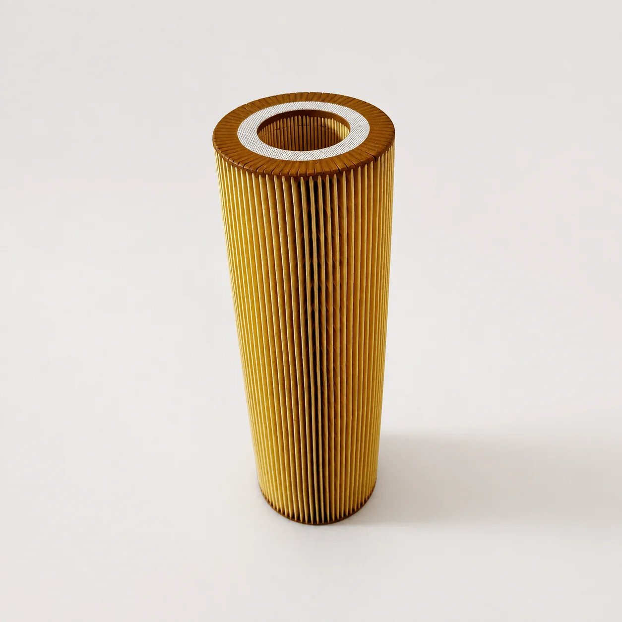 Clean studio photograph of a Jinguan HU1077/2X oil filter element